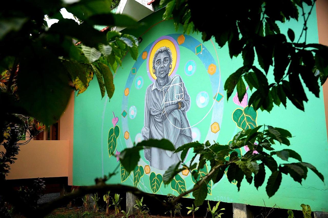 About Us 1 Garden artwork surrounded by lush greenery at Wayanad Lakeshore Resort