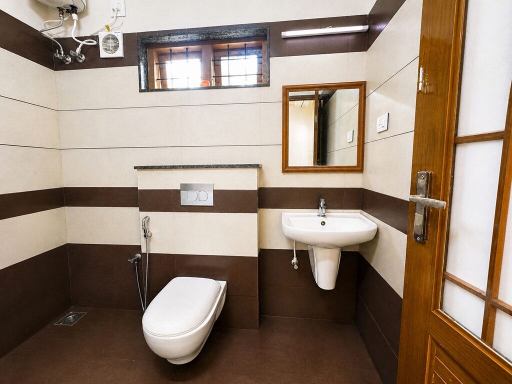 Rooms & Cottages 11 Spacious attached bathroom with modern fittings in Premium Duplex Cottage at Wayanad Lakeshore Resort