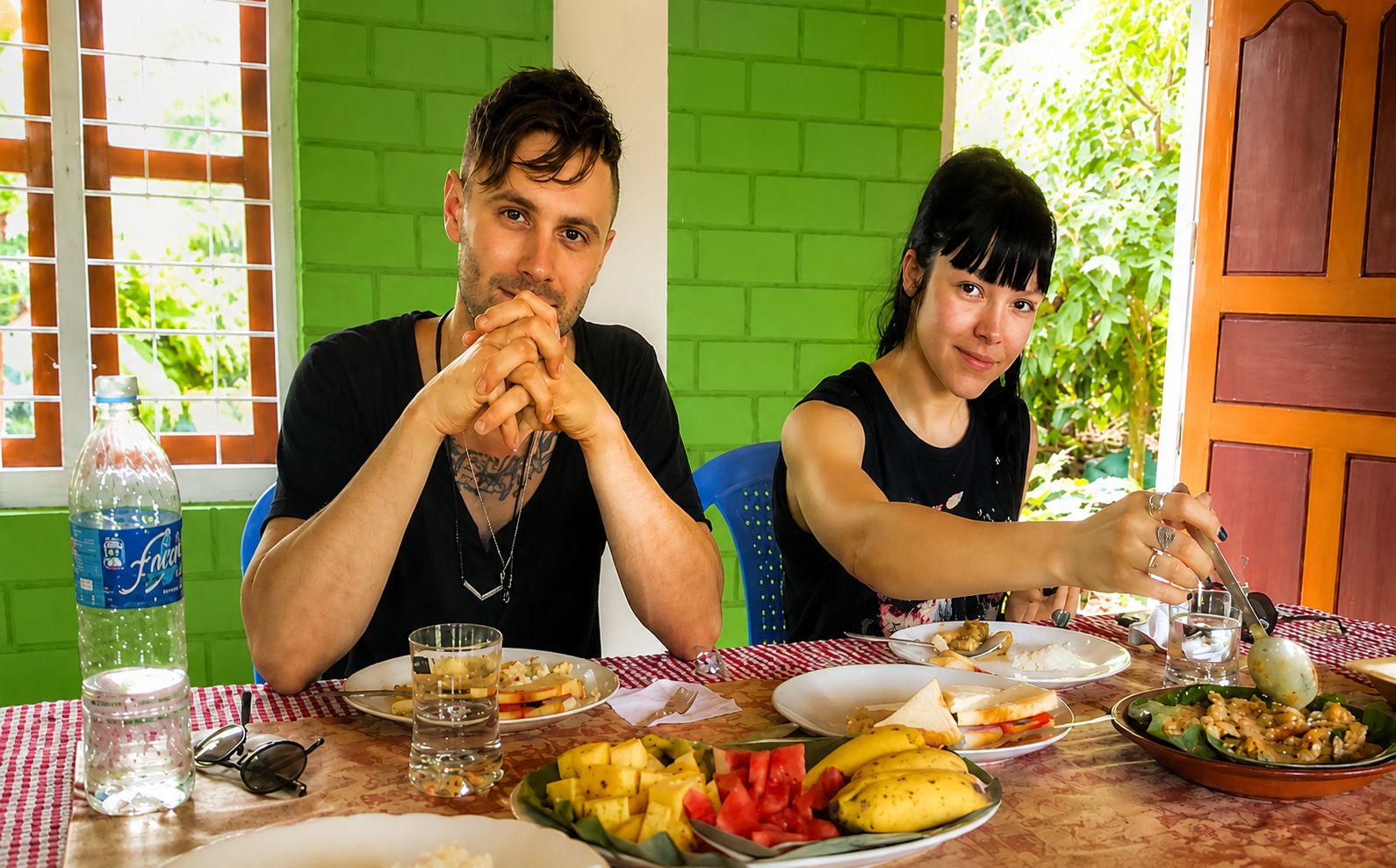 Wayanad Honeymoon Packages 2 Couple enjoying a romantic dining experience at Wayanad Lakeshore Resort honeymoon package