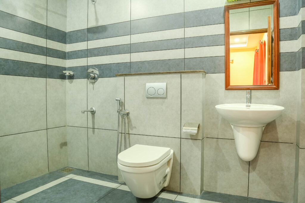 Rooms & Cottages 5 Attached bathroom in Premium Cottage at Wayanad Lakeshore Resort with modern fittings and clean interiors